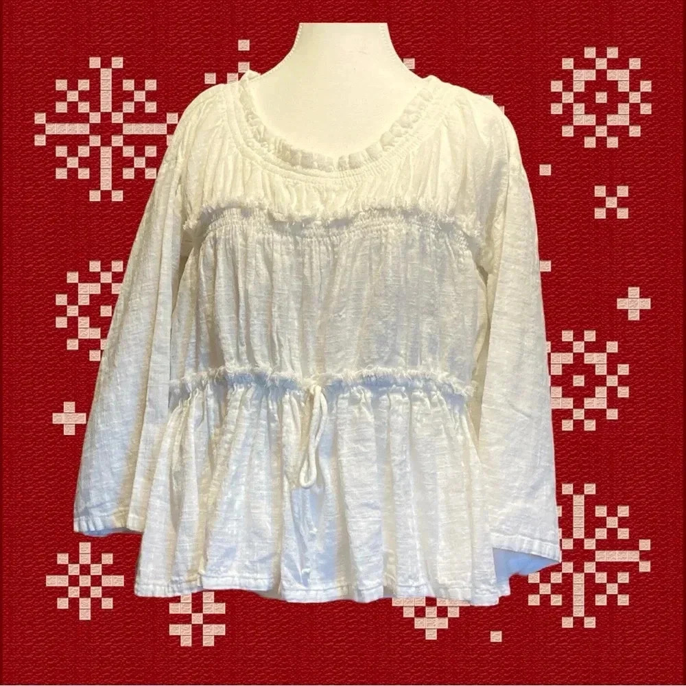 Free People ivory colored ladies top size XS
BIN 29